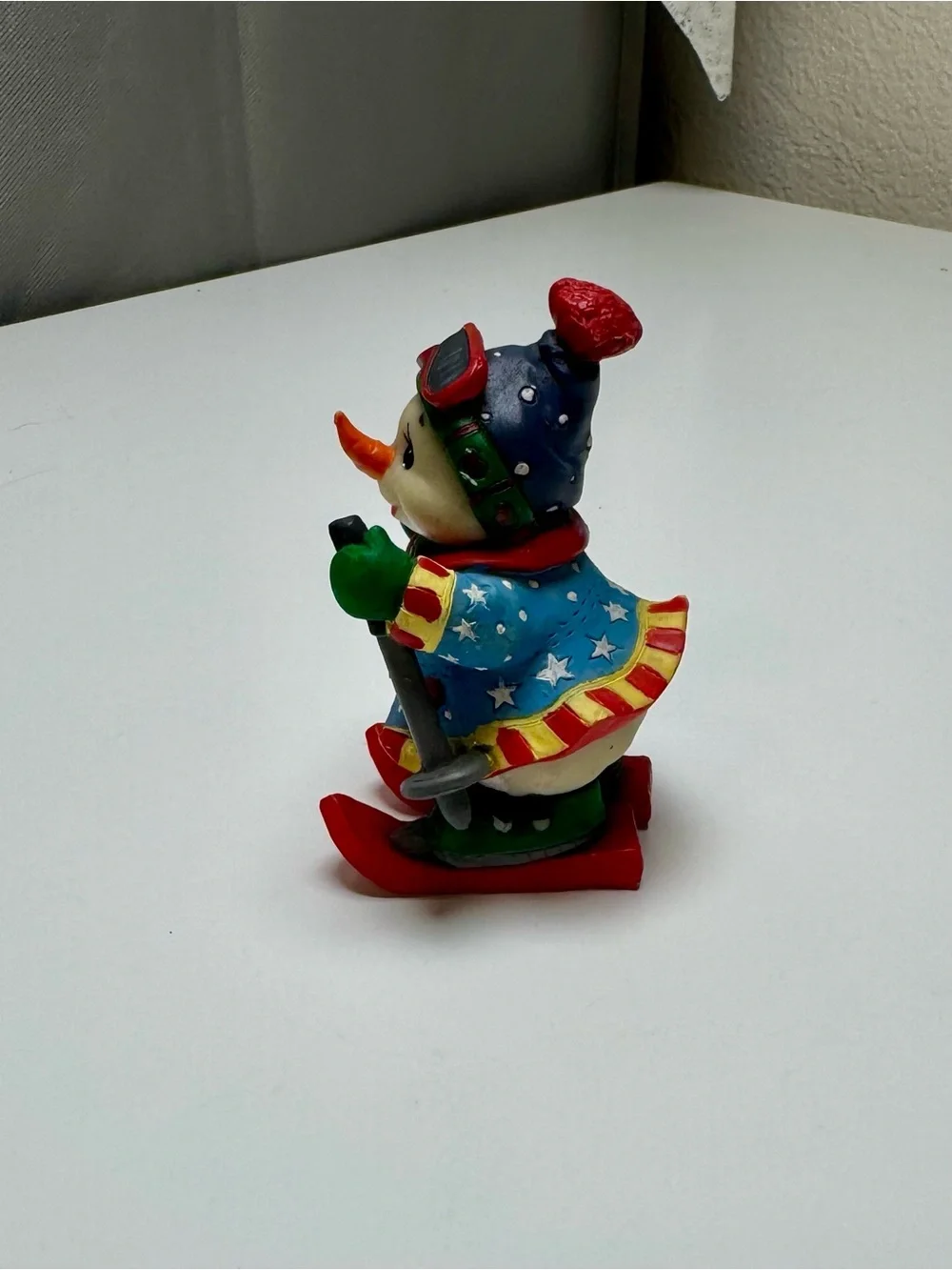 Colorful Red & Green Ski Snowman Resin Figurine